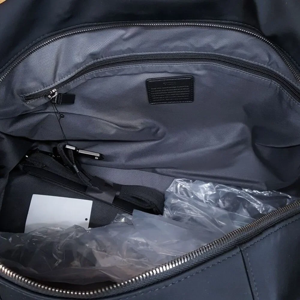 TUMI Nelson Harrison Duffle In Black Crossbody Strap $675